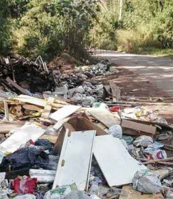 Lixo despejado próximo às margens do Corumbataí: crime ambiental e ameaça ao meio ambiente