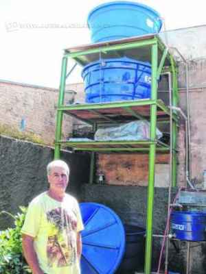 Domingos Sávio criou sistema que capta água da chuva e, também, reaproveita a que é utilizada na máquina de lavar roupas