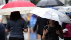 Pessoas com guarda-chuva em Rio Claro